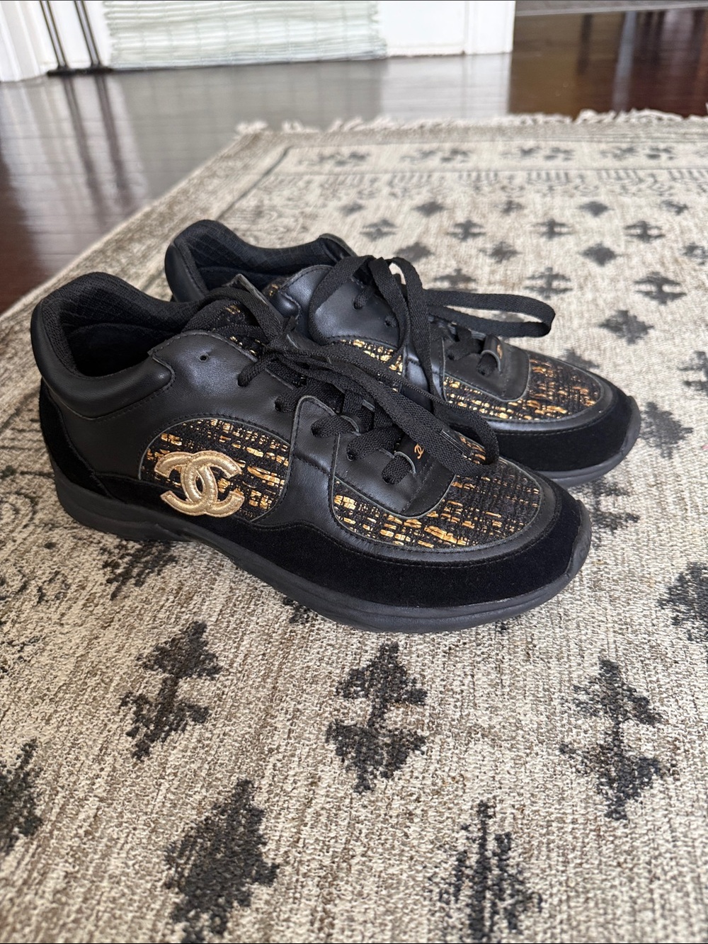 CHANEL Black Sneakers with Gold Tweed Accents
